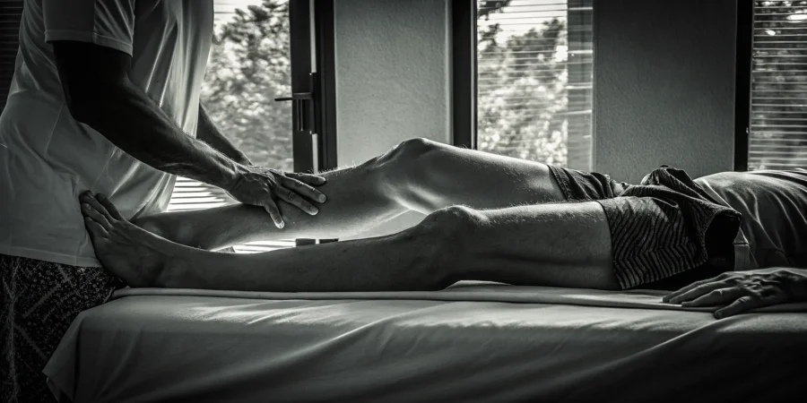 Athlete receiving post workout therapeutic bodywork